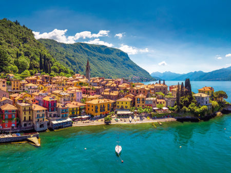 Aerial view of Varena old town on Lake Como with the mountains i